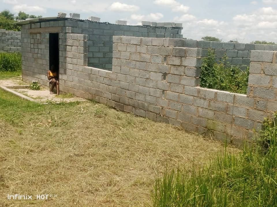 House for sale in 15 miles Asking price K110,000 Negotiable.